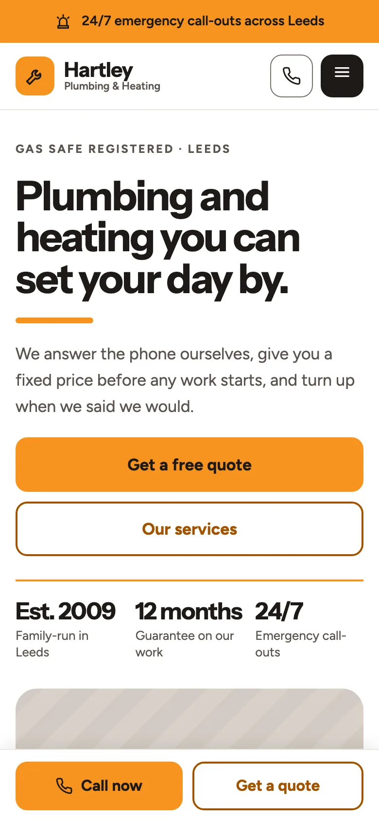 Tradeline home page in the Safety Orange palette, on a phone